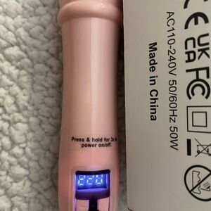 Pink Curling Iron.